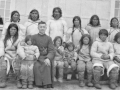 Priest with a group of Inuit