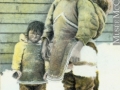 Inuit woman and children in Kuujjuaraapik