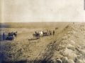 Team of workers in the irrigation channel of the Milk River, Alberta