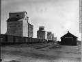 Grain elevators and railway, Claresholm, Alberta, 1918