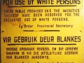 This sign indicates for whites only