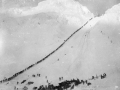 Packers ascending summit of Chilkoot Pass towards Yukon, 1898